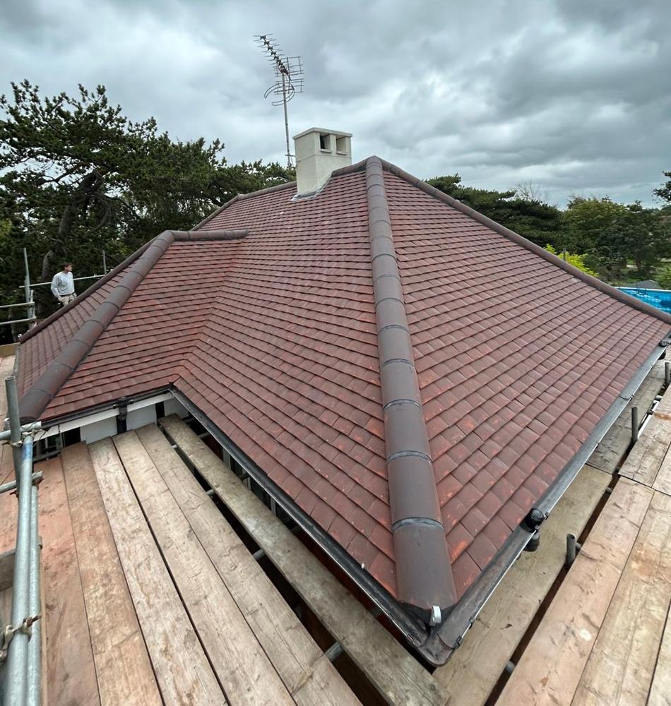 Roofing work covering tile, slate, felt, and flat roofs by Arkview