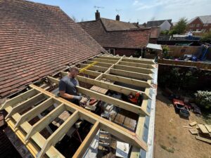 Building work in progress showing wooden rafters