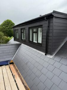 Close-up view from scaffolding of a slat roof, newly finished