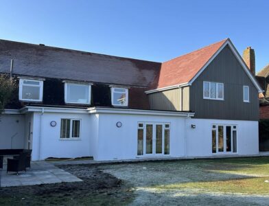 Large detached house with ground floor and side extension.
