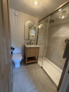 Shower room with toilet and vanity unit